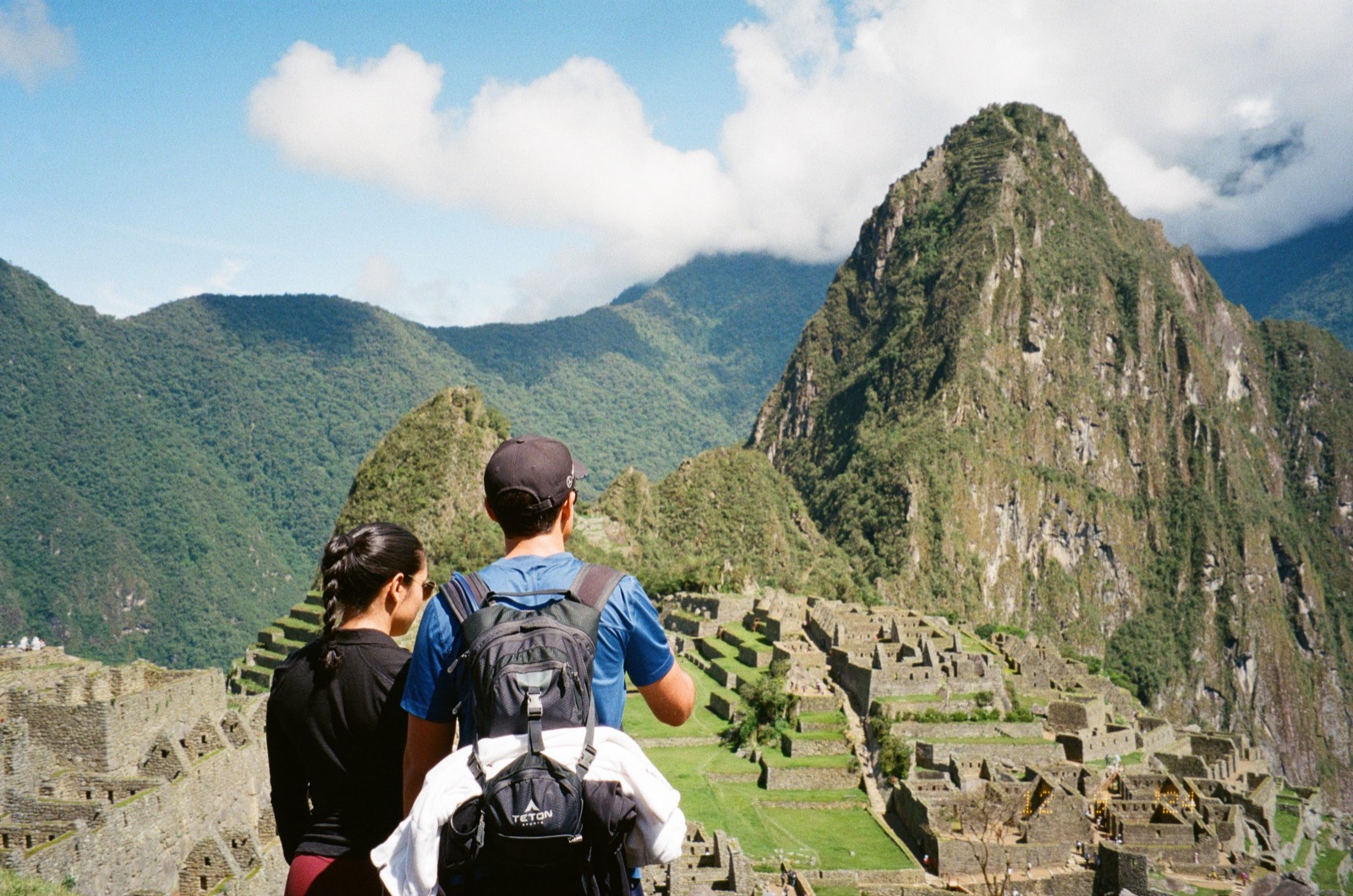 Couple overlooking Machu Picchu - what financial independence and the FIRE lifestyle can unlock for DINK couples
